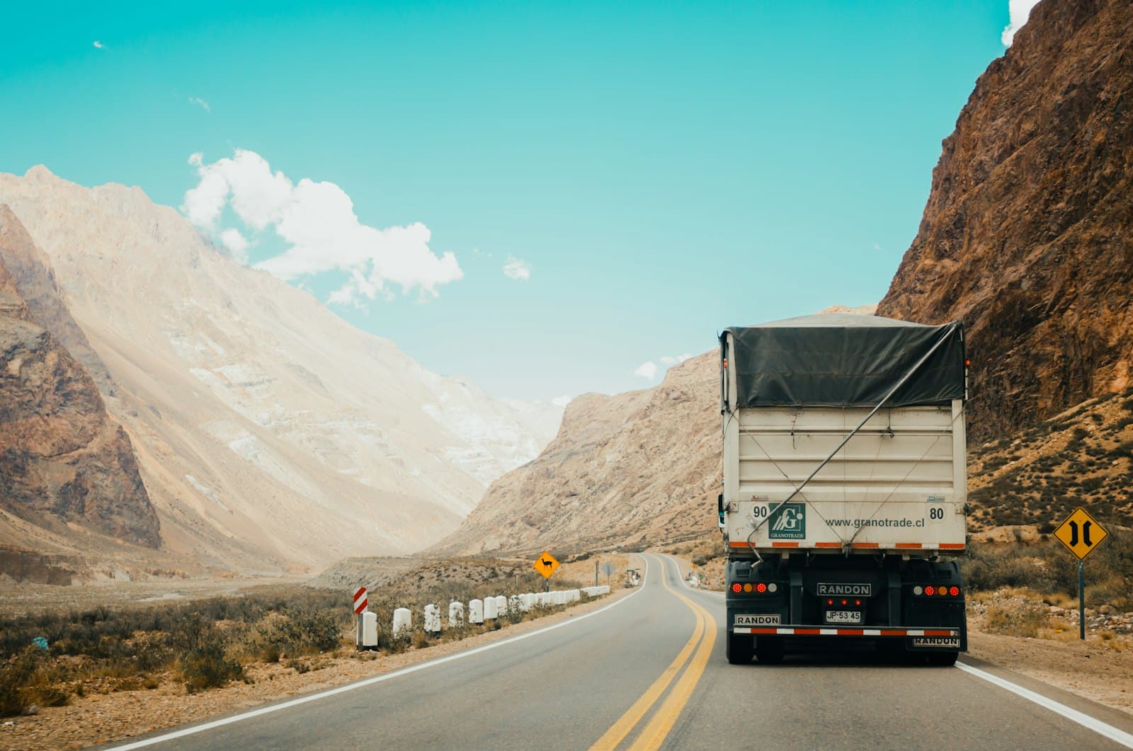 Trucks on an interstate, used here as a picture of freight moving, not of a software vendor.